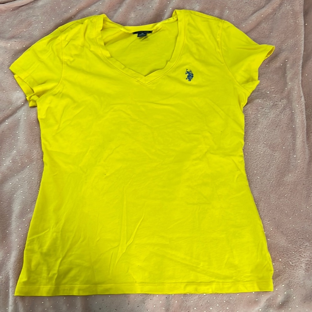 yellow polo shirt